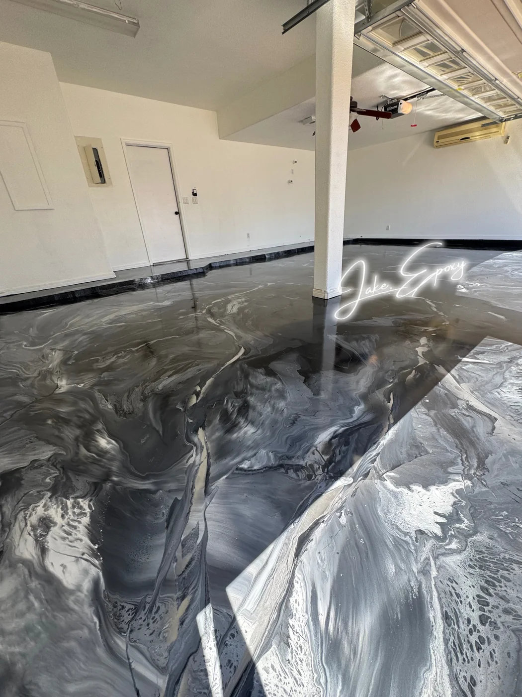 Dark metallic epoxy garage floor