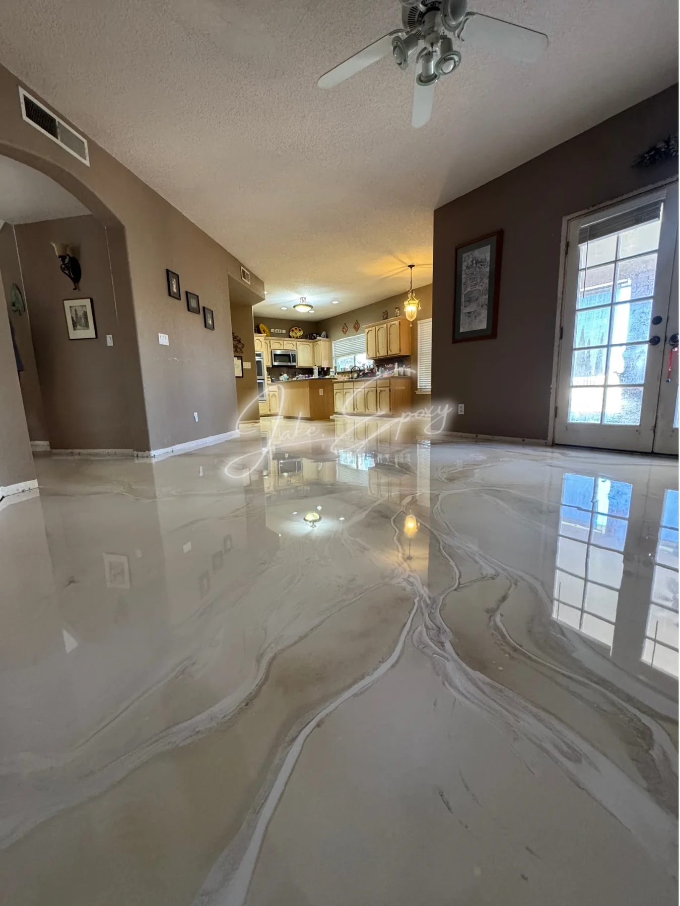 White metallic epoxy floor in a living space
