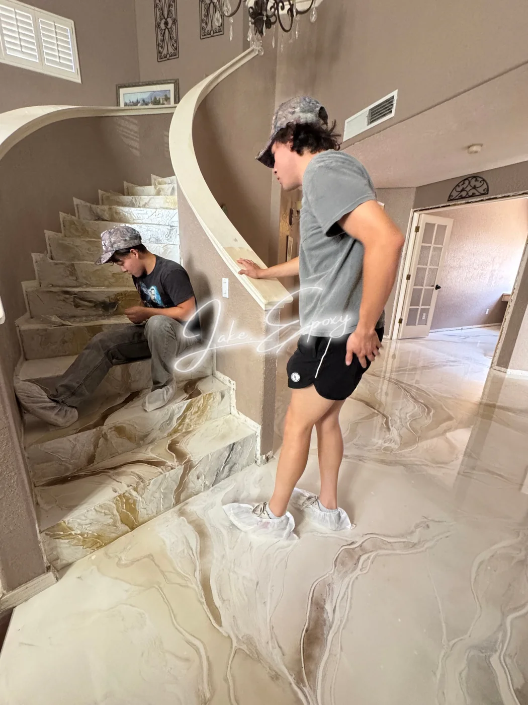 Process photo on white metallic epoxy floor near stairs